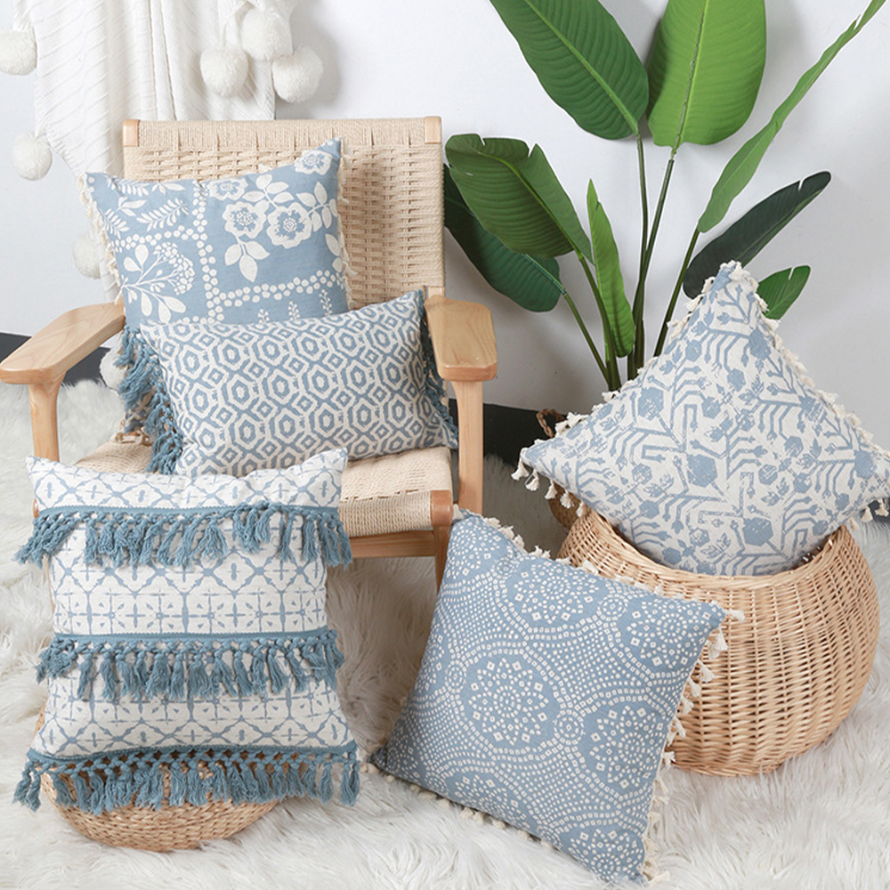 Coussin décoratif imprimé avec pompon